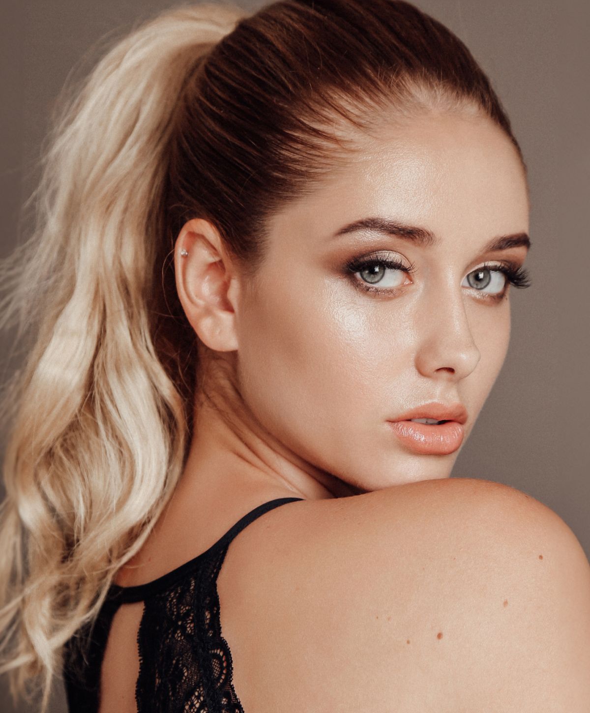 Profile of a woman with glowing skin.