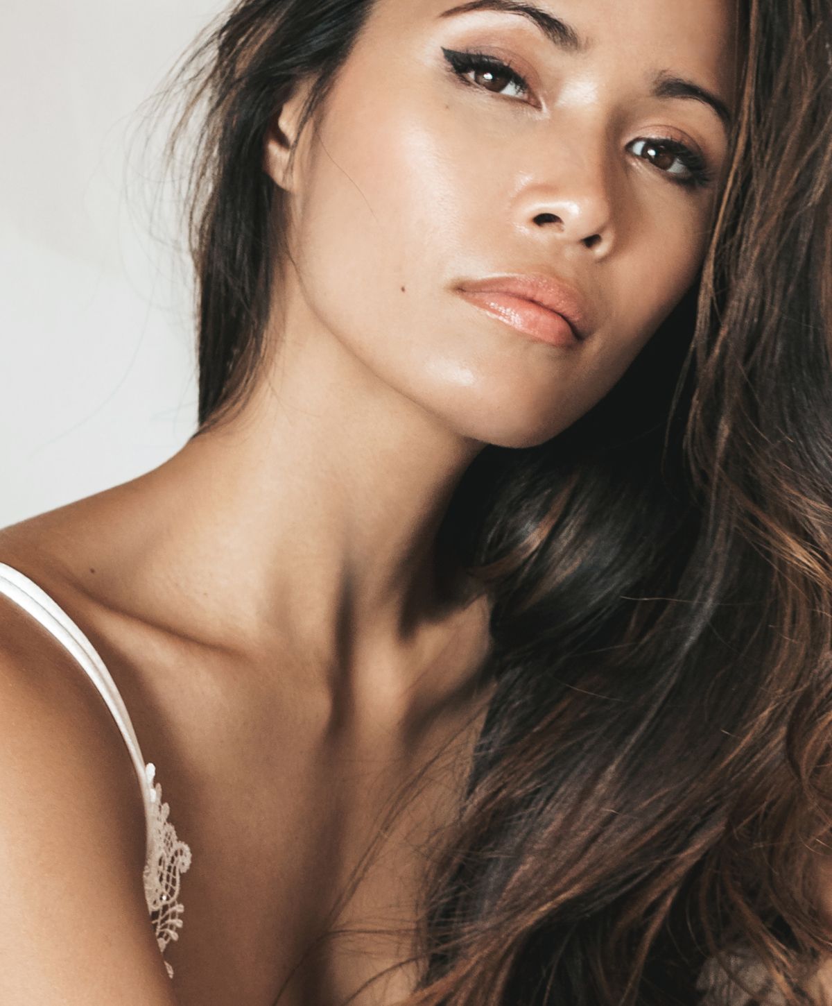 Close-up portrait of a woman with long hair.